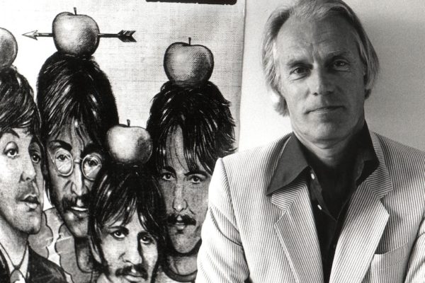 George Martin with Beatles poster (Getty Images)