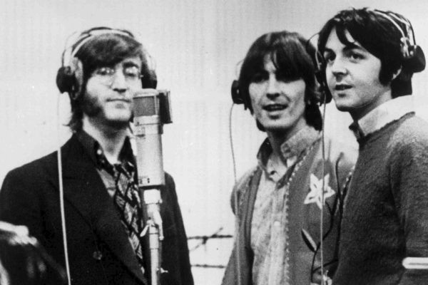 Three Beatles With Headphones Getty