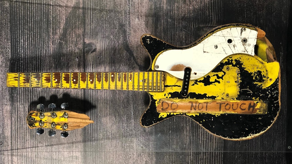 old yellow guitar